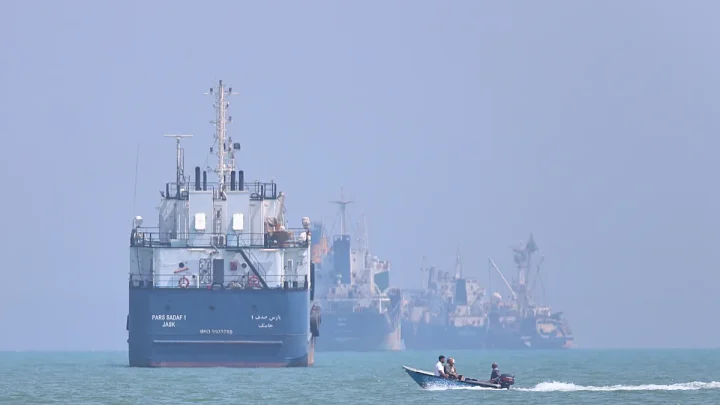 Breaking news. Cargo ship hit by projectile in Hormuz as Iran issues renewed passage warning