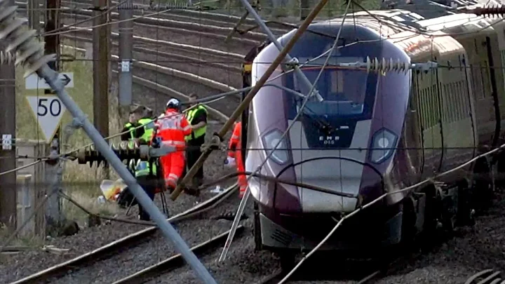 Driver dies and nine people are in critical condition after two trains collide in the UK