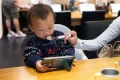 Babies should not use screens at all in the first two years, major review finds